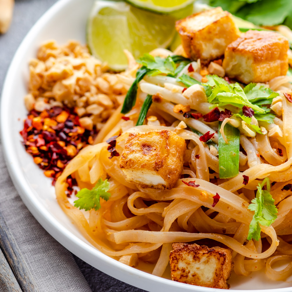 an image of vegan pad thai with peanut sauce