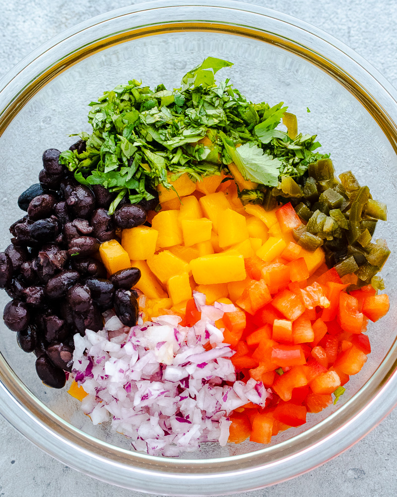 an image of chopped ingredients for mango salsa