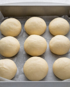 an image of rolled dough in a baking dish