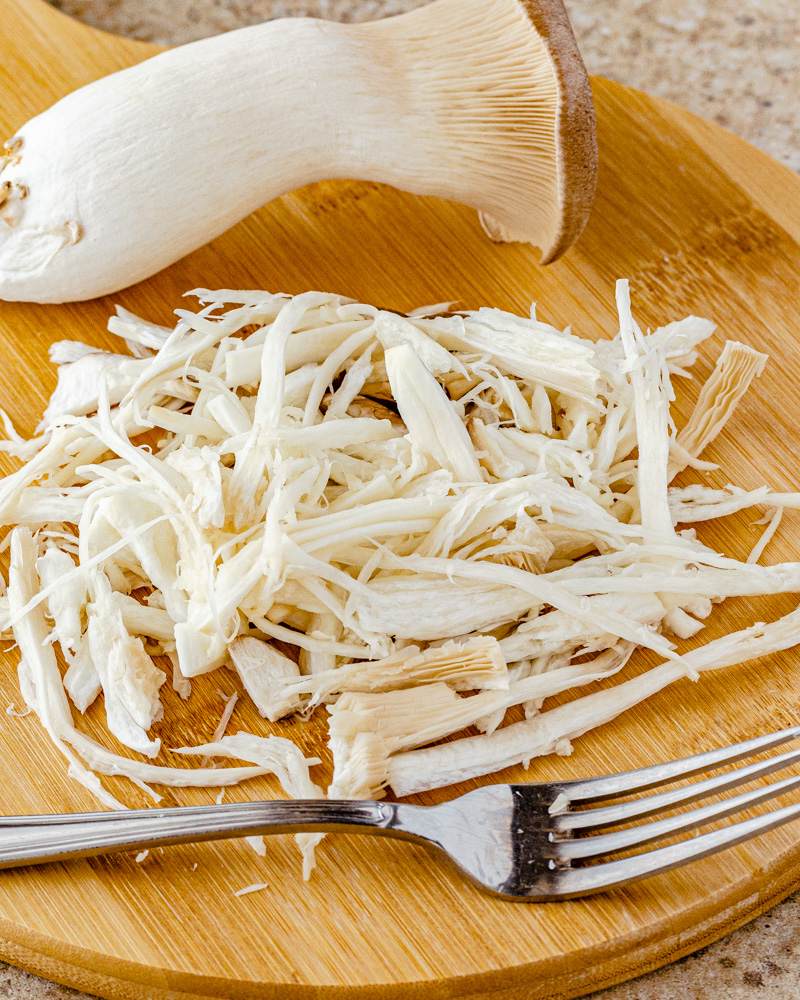 an image of shredded king oyster mushrooms