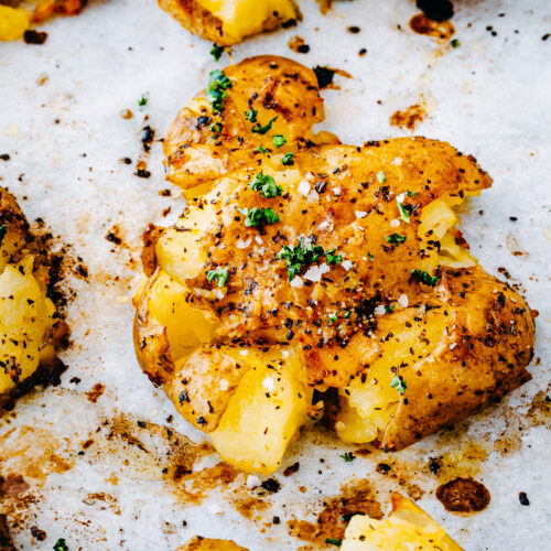an image of smashed lemon garlic potatoes
