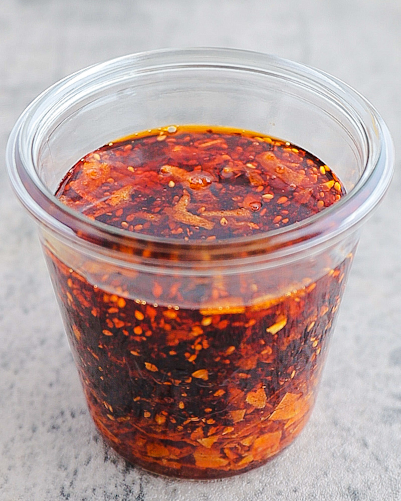 an image of homemade chili crisp in a glass jar