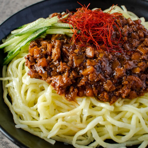 an image of vegan zha jiang mian - fried sauce noodles
