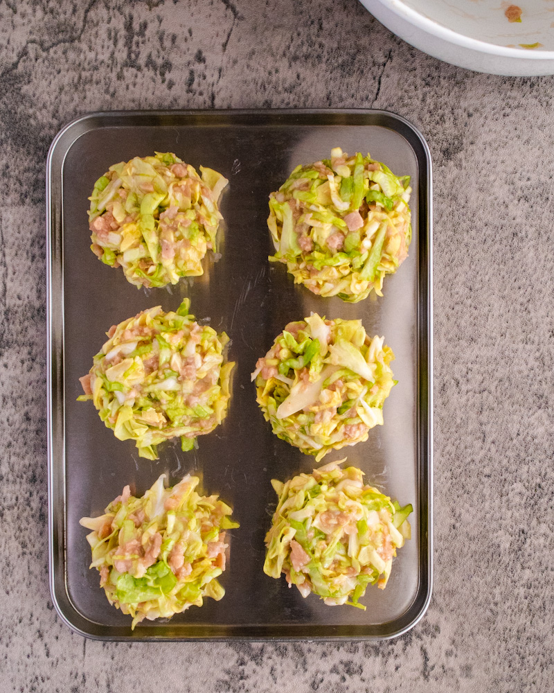 an image of vegan okonomiyaki patties on a tray