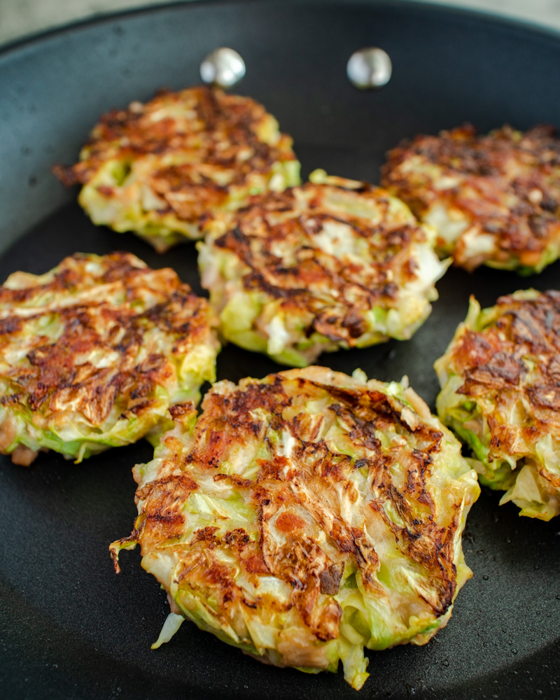 an image of vegan okonomiyaki in a frying pan